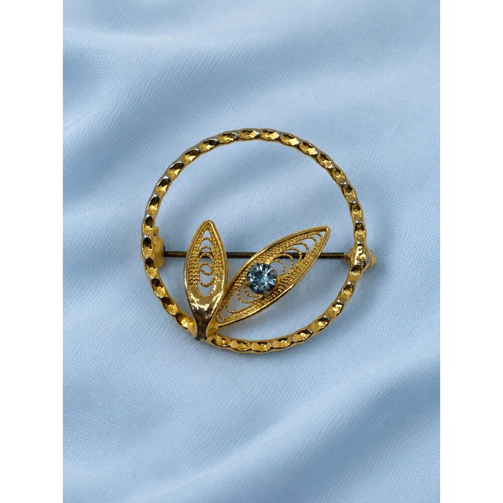Gold Tone Circle Brooch Blue Rhinestone Filigree Leaf Vintage Style Pin Unmarked
